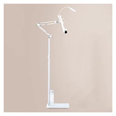 Imagem de Suporte de leitura ajustável e resistente com braço longo e rotação multiangular, suporte de chão para mesas/camas, inclui luminária - suporte versátil para leitura confortável.