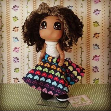 Imagem de Boneca Preta em Porcelana Fria - Os Grashis