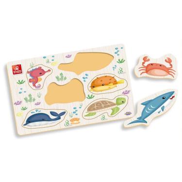 Imagem de Ache E Encaixe Dos Bichos Mar Em Madeira