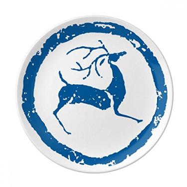 Imagem de Prato de porcelana decorativa com desenho de cervo e animal azul