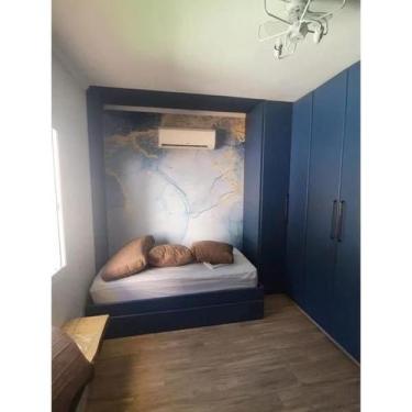 Imagem de Papel de Parede Marmore Liquido Tons de azul com detalhes em dourado -