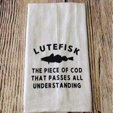 Imagem de HomeTow Lutefisk O pedaço de bacalhau que passa por tudo compreensão toalha de prato humor norueguês norueguês toalha de banheiro branca 14 x 30 pol (35 x 75 cm) Cor: Lutefisk