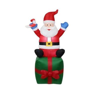 Imagem de Decorações De Natal Infláveis Com Papai Noel Sentado Em Caixa De Prese