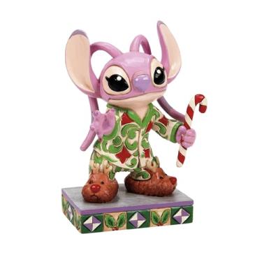 Imagem de Enesco Coleção Disney Traditions por Jim Shore Lilo e Stitch Angel em pijama de Natal - Estatuetas colecionáveis de Natal da Disney em resina pintada à mão, estátua de decoração de casa, 11 cm