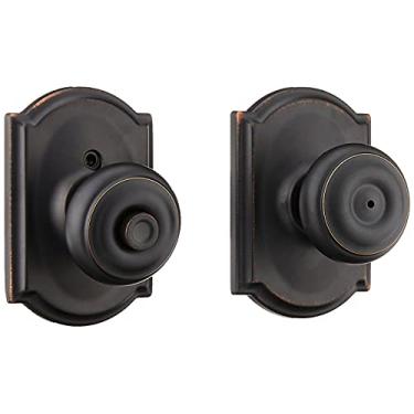 Imagem de Maçaneta com trava Schlage F40 GEO 716 CAM, estilo georgiano com acabamento Camelot, bronze envelhecido
