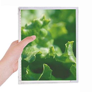 Imagem de Caderno fotográfico com folhas soltas e agenda recarregável com folhas de papel