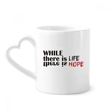 Imagem de Citação While There Is Life There Is Hope Caneca de café cerâmica copo de coração de vidro