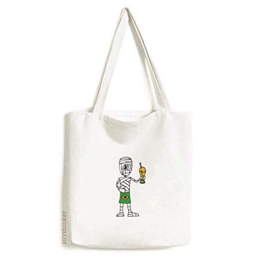 Imagem de Bolsa de lona com estampa de múmia e troféu de futebol brasileiro