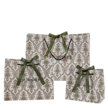 Imagem de Sacola de presente, folha verde, papelão branco, estilo de formatura, pacote com 3