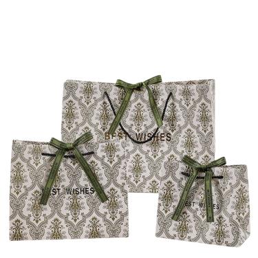 Imagem de Sacola de presente, folha verde, papelão branco, estilo de formatura, pacote com 3