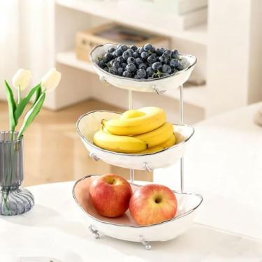 Imagem de Afeyibu Tigelas de frutas de 3 camadas para balcão de cozinha, tigela de cerâmica branca com suporte de metal prateado, cesta de frutas de 3 camadas para frutas, lanches, bolos, nozes, armazenamento
