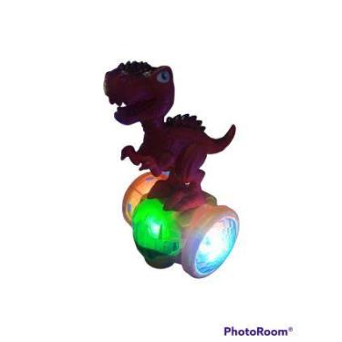 Imagem de Brinquedo dinossauro musical no globo giratorio e muito divertido. - t