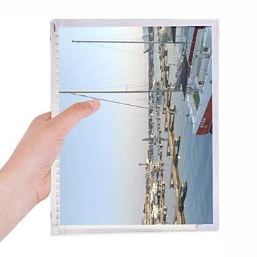Imagem de Caderno para fotografia de navio de cais com folhas soltas e diário recarregável