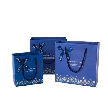 Imagem de Conjunto de sacolas de presente com design floral azul com laços de fi