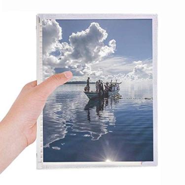 Imagem de Caderno de anotações com folhas soltas e diário de madeira para barco azul oceano