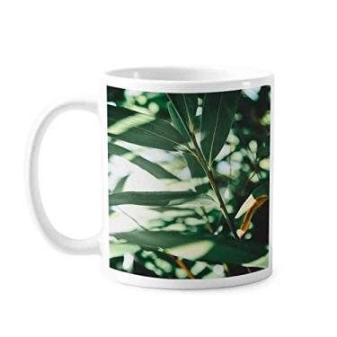 Imagem de Caneca de cerâmica para foto da natureza de folhas verdes Caneca de porcelana de café