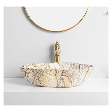 Imagem de Lavatório de cerâmica para pia de banheiro com textura de mármore arte oval acima do balcão lavatório com torneira dourada e pia de vaso de drenagem