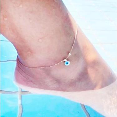 Imagem de TORNOZELEIRA MALHA VENEZIANA COM PINGENTE OLHO GREGO MADREPÉROLA EM OU