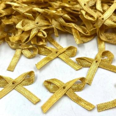 Imagem de Aplique Mini Laço Cetim 4mm Dourado Gold 120un Costura Arte - Macall