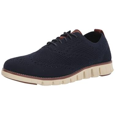 Imagem de Cole Haan Sapato Oxford masculino Zerogrand Stitchlite Wingtip, Malha azul marinho/marfim, 7 Wide