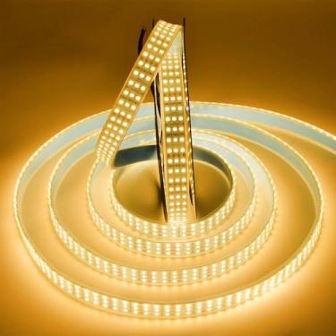 Imagem de SUYOOULIN Fita de luzes LED, 5 m regulável CC 12V SMD 2835 fileiras triplas 1800 LEDs 38000LM fita de LED super brilhante, tubo à prova d'água IP67 para decoração de festa em casa (branco quente 3500K