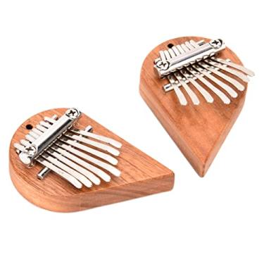 Imagem de Piano de polegar portátil, em forma de coração, leve, mini instrumento de dedo, kalimba para entretenimento para viajar, para amantes da música (um conjunto de coração (esquerda + direita))