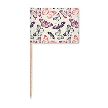 Imagem de Borboleta em fundo rosa pálido bandeiras de palito de dentes, marcador, enfeite de festa