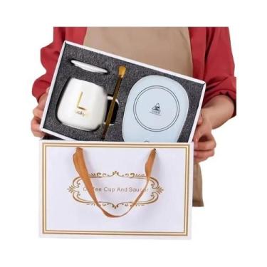 Imagem de Conjunto De Canecas De Café Cerâmicas Isoladas Com Aquecimento a 55 Gr