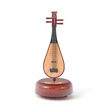 Imagem de Design de tubo giratório de caixa de música com instrumento clássico -