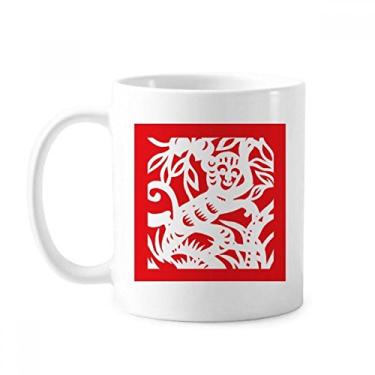 Imagem de Caneca de cerâmica com estampa de macaco com corte de papel e porcelana