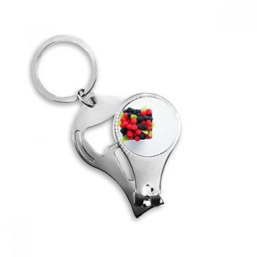 Imagem de Foto de frutas vermelhas temperadas anel de alicate de unha chaveiro abridor de garrafa cortador