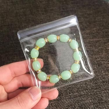 Imagem de SUBGIU Bolsas de joias antimanchas de PVC transparente para armazenamento de joias com zíper embalagem de plástico para brincos (50 peças de sacos de joias de PVC grandes 10,5 x 10,8 cm)