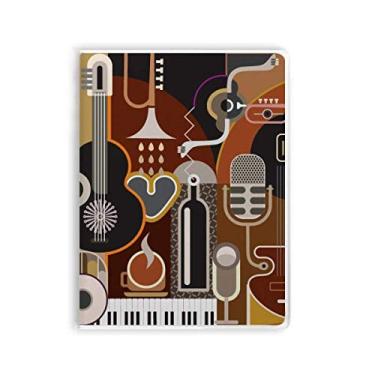 Imagem de Caderno com estampa abstrata de violão musical ilustrado com estampa azul, capa de goma para diário
