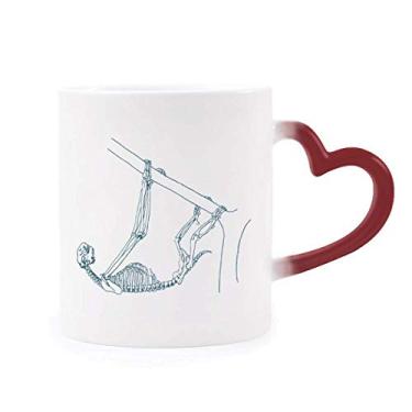 Imagem de Caneca de grés com desenho de bicho-preguiça sensível ao calor vermelha que muda de cor