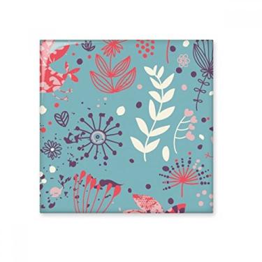 Imagem de Azulejo de cerâmica brilhante com tinta de plantas de folha azul