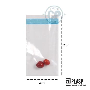 Imagem de Bobina para Unitarização transparente 4 x 7 cm c/ fita Inv e  serrilha no fundo - 10.000 UNDS