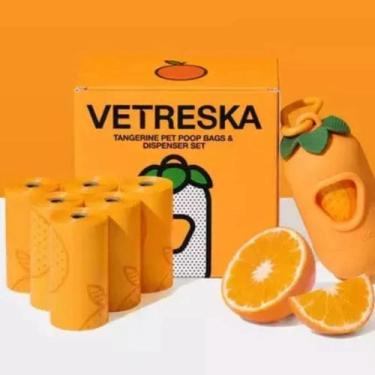 Imagem de Vetreska Kit Cata Caca Para Cães Tangerina 1 Dispenser e 7 Rolos Refil