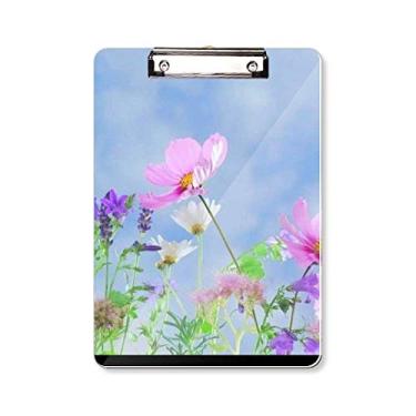 Imagem de Plano de fundo azul roxo flores rosa prancheta pasta escrita placa de suporte A4