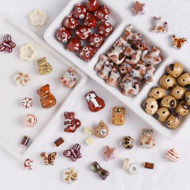 Imagem de Decoendiy 22 peças de contas de cerâmica em forma de animal e flor, porcelana pintada à mão coração estrela filhote de cachorro gato bonito desenho animado solto espaçador contas para fazer joias faça
