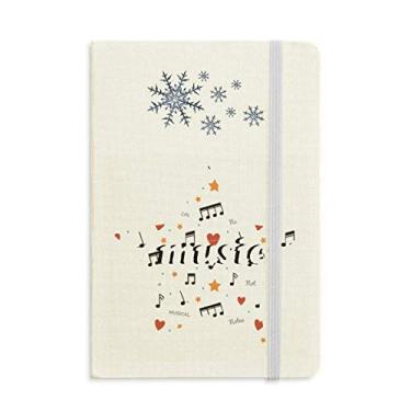 Imagem de Caderno de notas musicais com estrelas e corações, flocos de neve, inverno