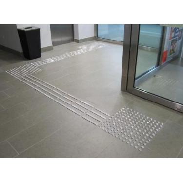 Imagem de Piso Tátil Alerta Inox Parafusados Elementos Soltos Ml