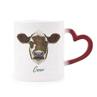 Imagem de Caneca de grés marrom e branco com leite, animal de vaca, sensível ao calor, muda de cor vermelha