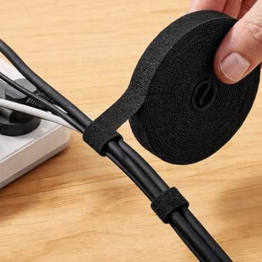 Imagem de Pacote com 1 rolo organizador de cabos preto ajustável | Organizador de fios flexível de 3 m para roteamento de cabos para desktop, TV e Home Theater