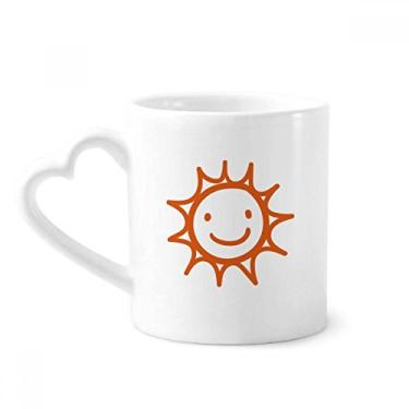 Imagem de Caneca de café de cerâmica com pintura à mão laranja e sorriso, copo de coração de vidro