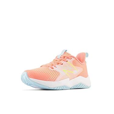 Imagem de New Balance Tênis infantil unissex Rave Run V2 com cadarço, Toranja/azul alvejante/Hi-lite, 6 X-Wide Big Kid