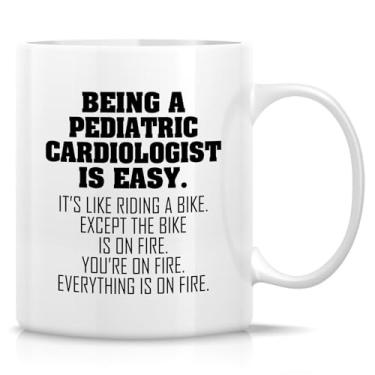 Imagem de Retreez Caneca divertida de cardiologista pediátrico - xícara de café ou chá de cerâmica de 325 ml - Presente hilário para médico do coração, especialista pediátrico, cardiologista - apreciação médica