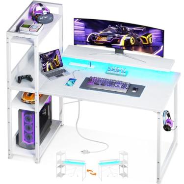 Imagem de ODK Mesa de computador reversível com porta de carregamento USB e tomada elétrica, mesa de escrita de 101 cm com prateleiras de armazenamento e suporte para monitor, mesa de estudo reversível para escritório em casa, quarto pequeno, branca
