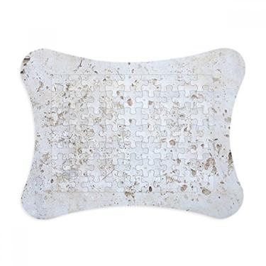 Imagem de Moldura de quebra-cabeça com textura de superfície áspera de parede branca ornamento de jogo de quebra-cabeça