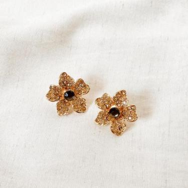 Imagem de Brinco Flor Dourada Strass Dourado Miolo Grafite - Camila Vanni