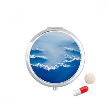 Imagem de Caixa de armazenamento de remédios com nuvens brancas, névoa cinza